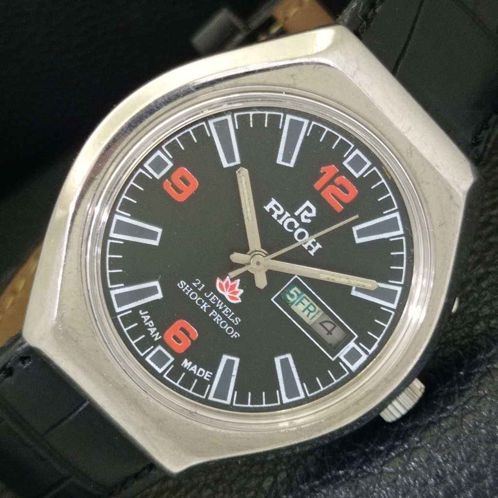 Vintage 1978 Ricoh Automatic Mens Silver Watch WDaydate  Red Accents